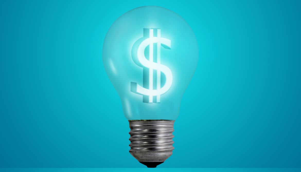 glowing lightbulb with dollar sign filament