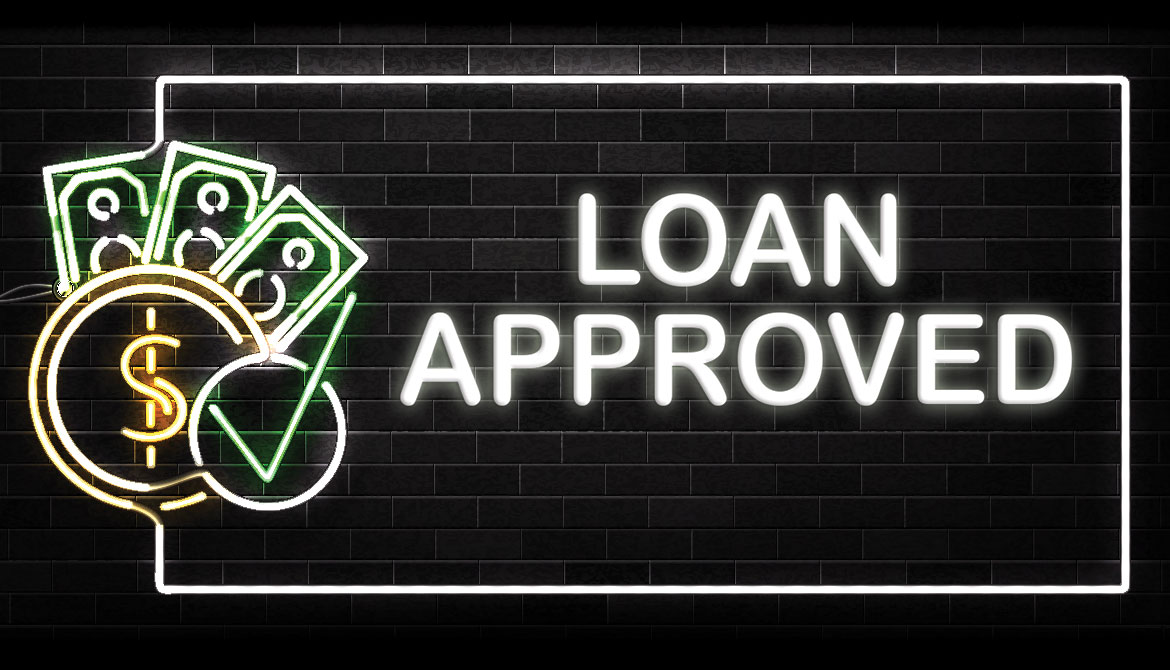 neon sign displaying cash and checkmark with text loan approved