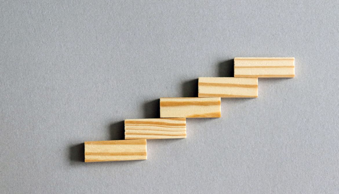 five wooden blocks form graph