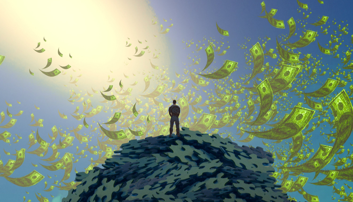man standing on mountain of puzzle pieces with money in the air around him