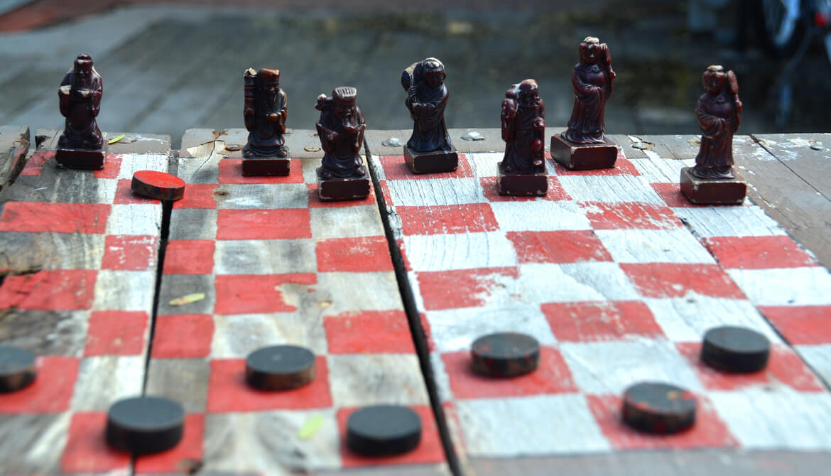 chess board with chess pieces and checkers