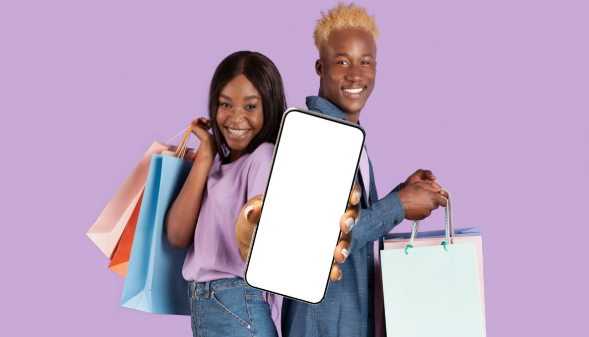 young black couple shopping with bags and smartphone