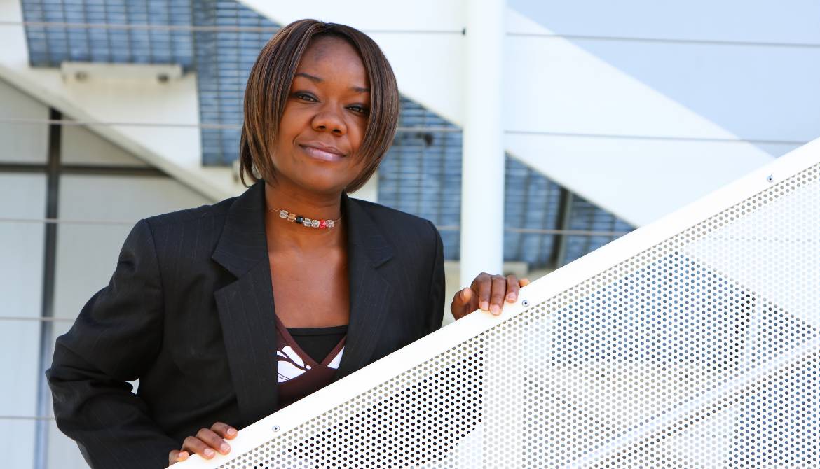 African-American business woman standing on the stairs