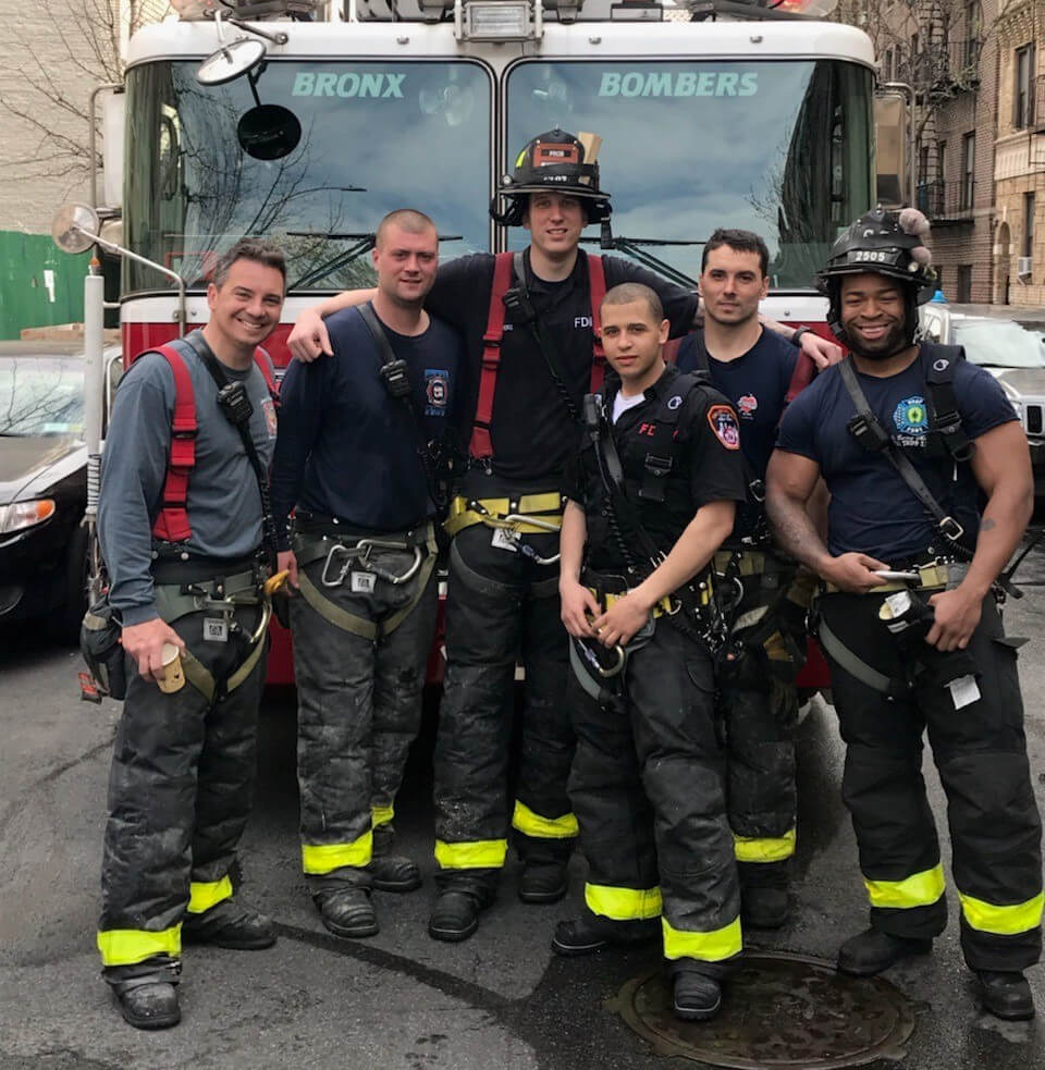 firefighters smiling at the camera