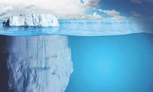 an ice berg goes deep into the ocean