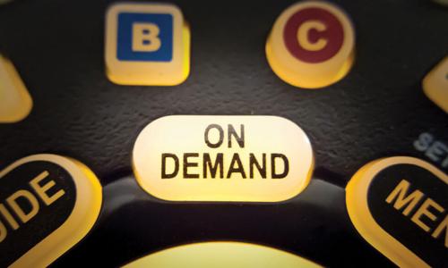 close up of TV remote and On Demand button