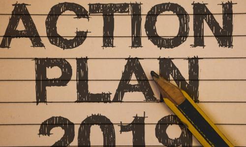 action plan 2019 scribbled on a notebook with a pencil 