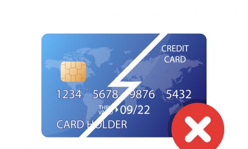 declined credit card cut in half diagonally with a red X in the corner
