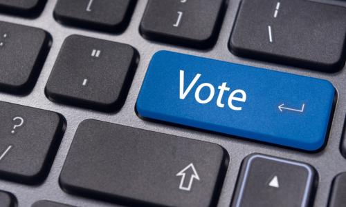 the word vote on a keyboard key