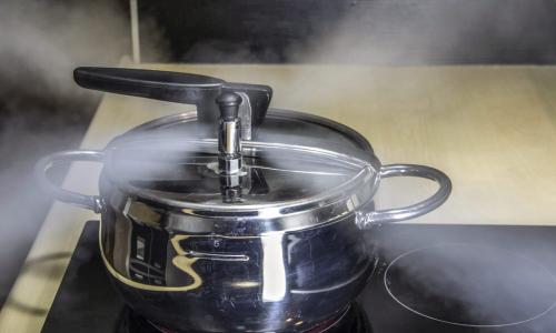 pressure cooker releasing hot steam