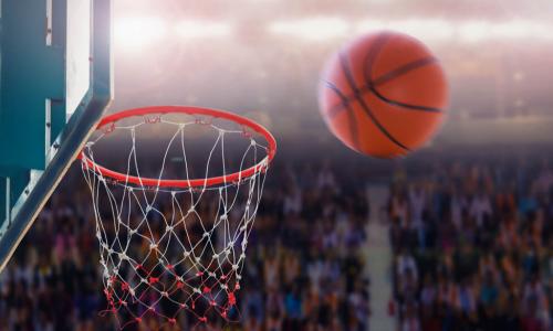 basketball at hoop on rebound