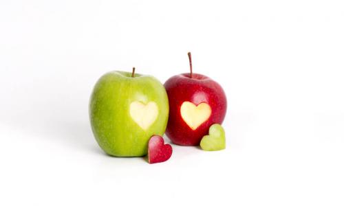red and green apples with hearts