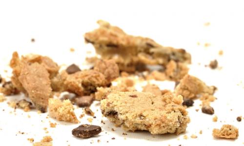 closeup of smashed crumbled chocolate chip cookie
