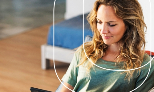 woman reading tablet
