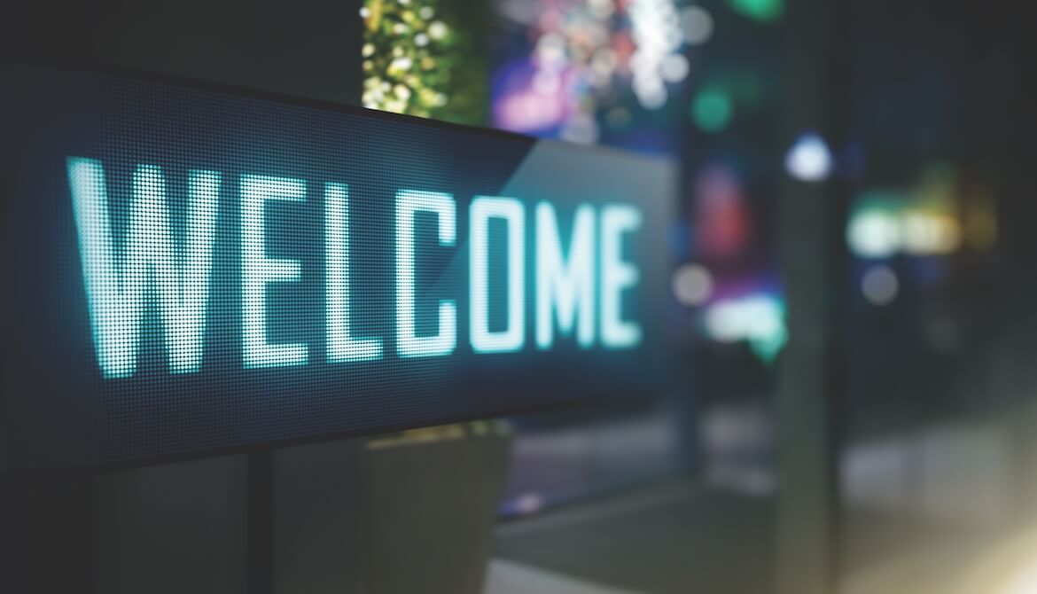 Digital sign displaying WELCOME