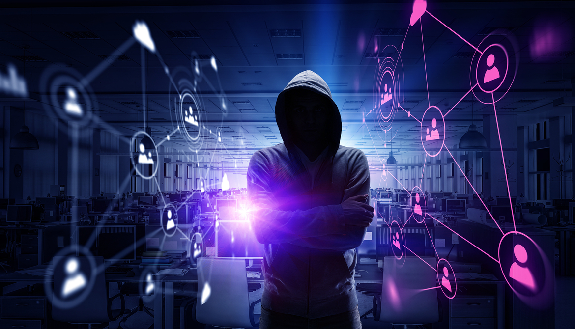 man in a hoodie on a techy background