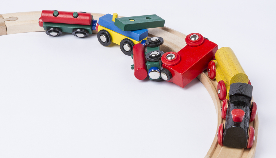 derailed wooden toy train
