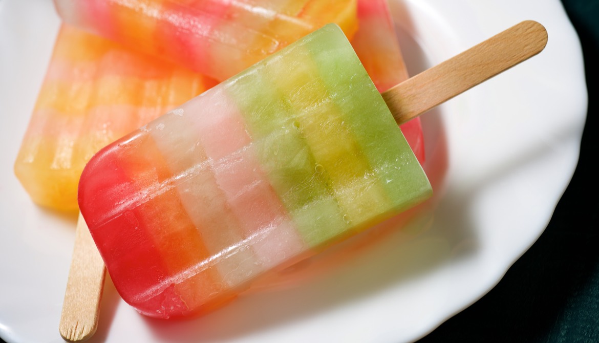 colorful popsicles on a white plate