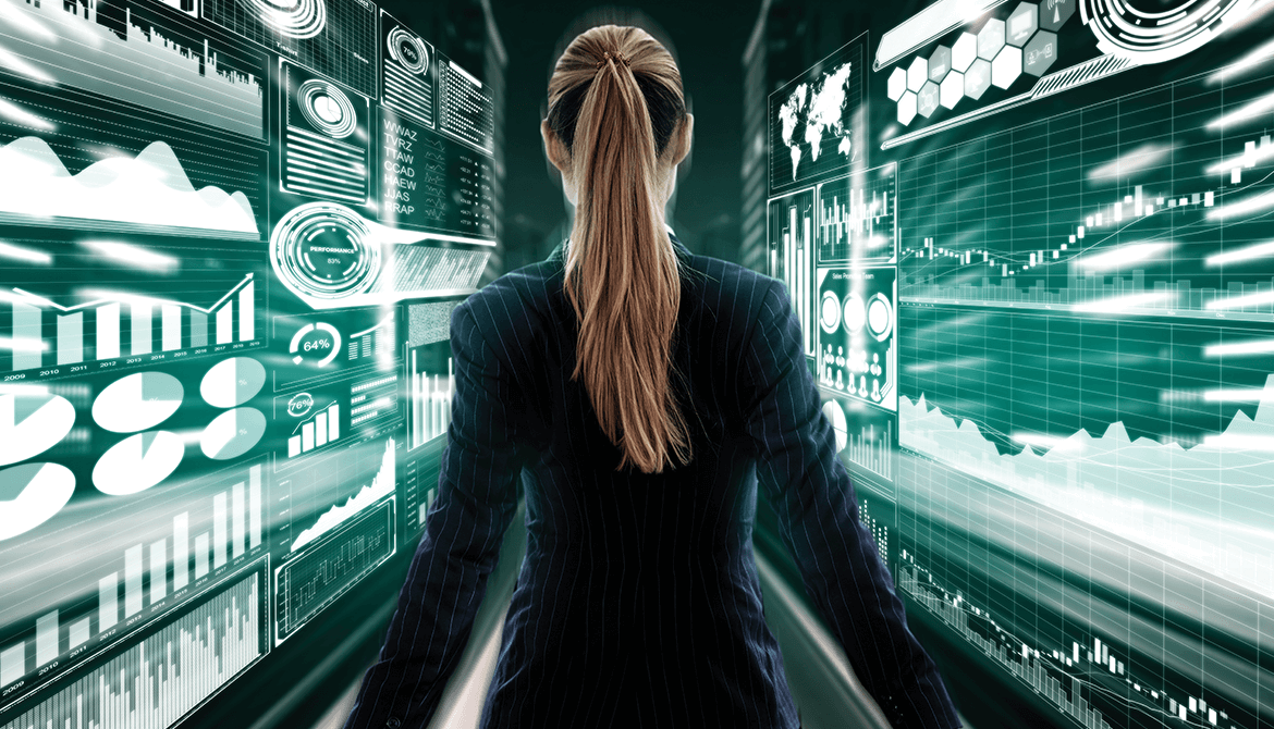 female business executive surrounded by digital dashboards
