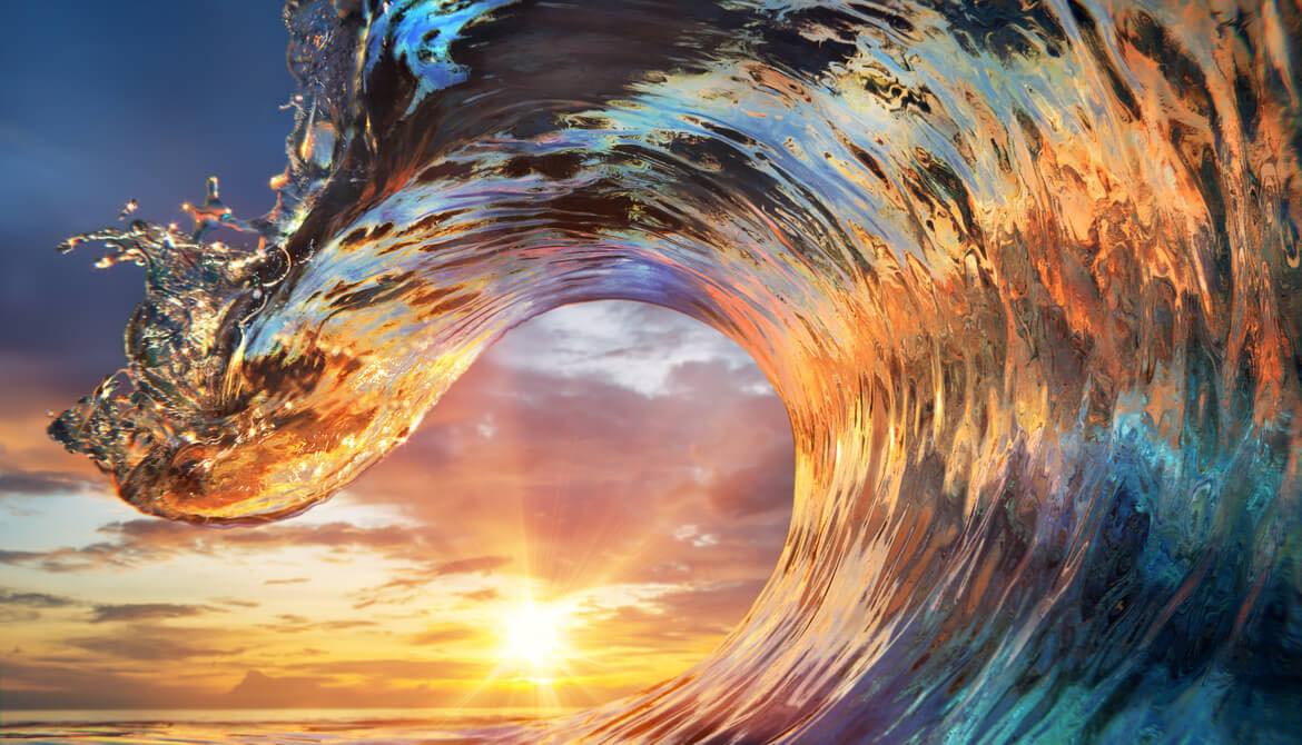 colorful ocean wave at sunset