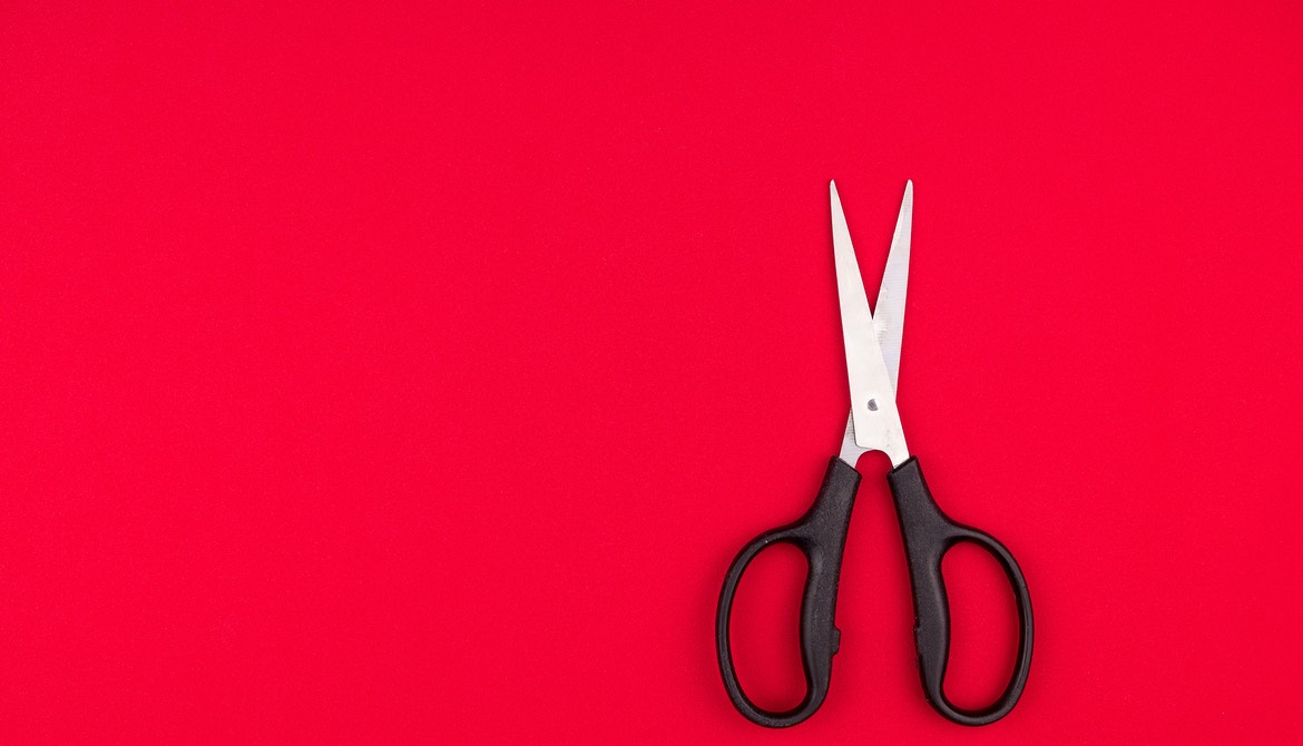 scissors on a red background