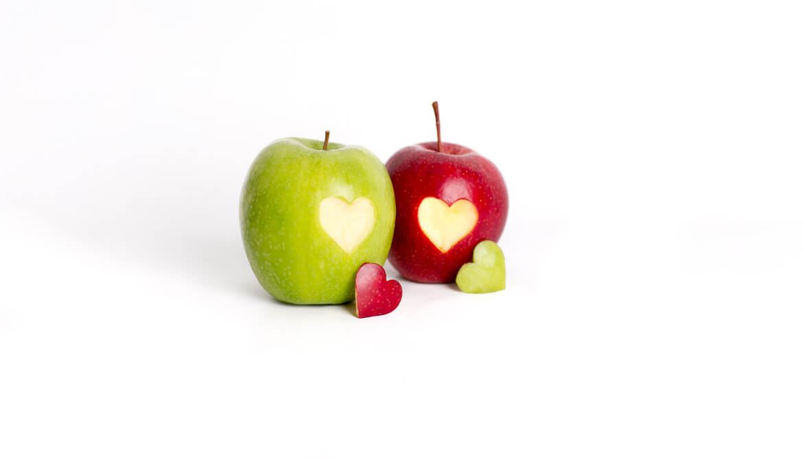 red and green apples with hearts
