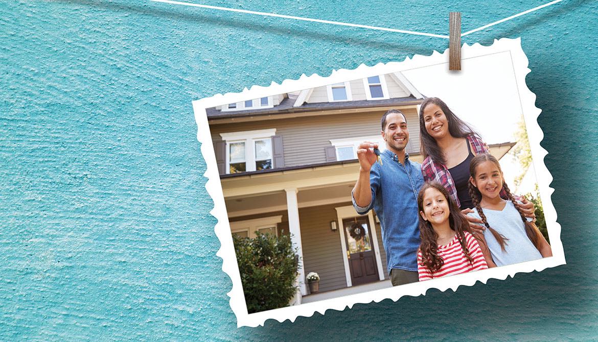 A postcard showing a family in front of their new house hangs against a bright blue wall