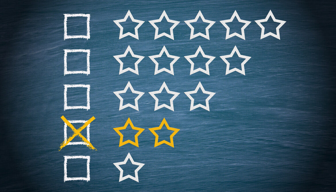 two stars drawn on chalkboard for low performance rating