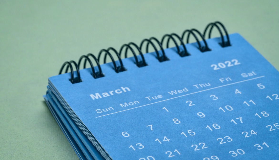 March 2022 blue spiral desktop calendar