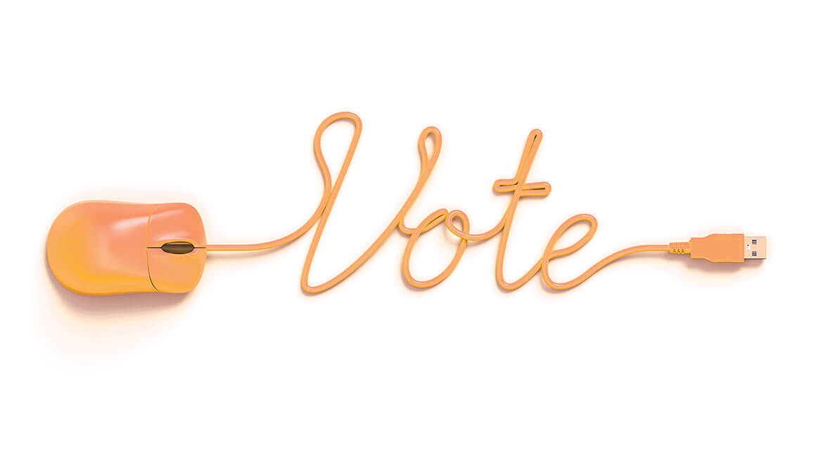 orange mouse cord spells out the word vote