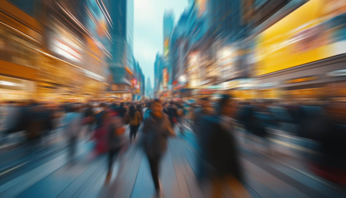 blurred image of people walking on the street