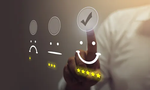 businessperson tapping a 5-star smiley face icon on a virtual touch screen survey