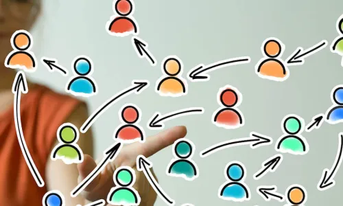 woman moving around figures on clear board