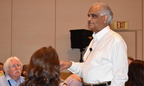 Ram Charan speaking at CUES Symposium