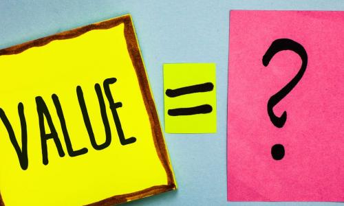 value = question mark written across brightly colored sticky notes
