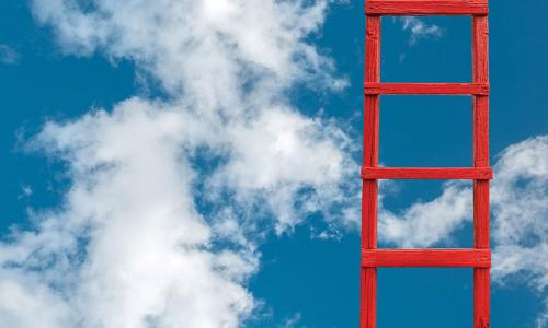 red ladder climbing into the clouds