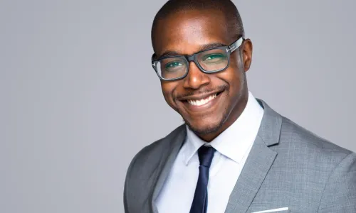headshot of a confident African American executive