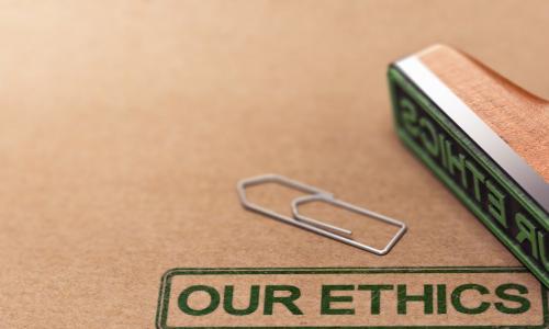 green stamp saying our ethics