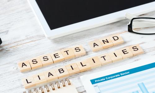 asset liability in squares on desk