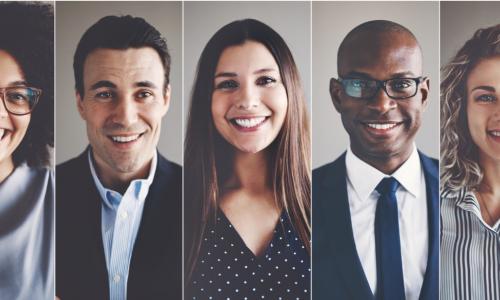 five smiling engaged people of diverse ethnic backgrounds