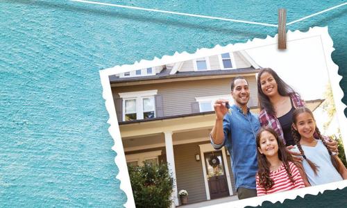 A postcard showing a family in front of their new house hangs against a bright blue wall