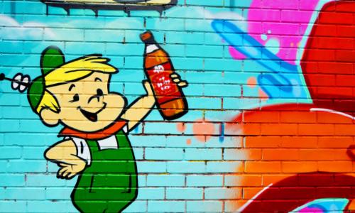 colorful cartoon panel of Jetson son with bottle