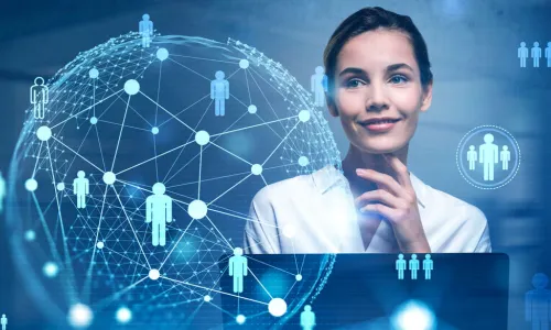 HR businesswoman working on laptop with floating digital image of a network of people and data points