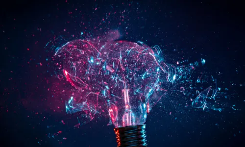 colorful electric light bulb exploding