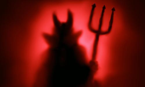 creepy devil in silhouette