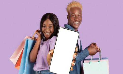 young black couple shopping with bags and smartphone