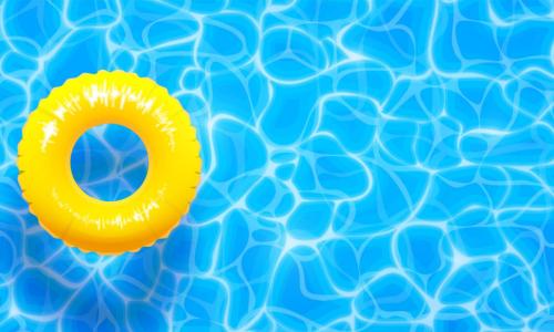 yellow pool ring floats on blue water