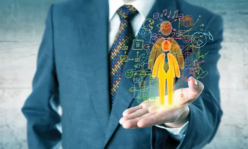 businessman holds colorful illustrated person with charts and graphs surrounding