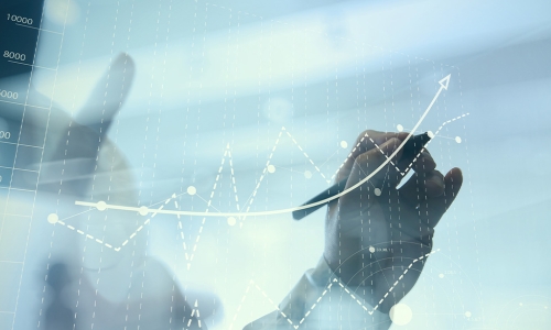 hands mapping out an upswing on graph 