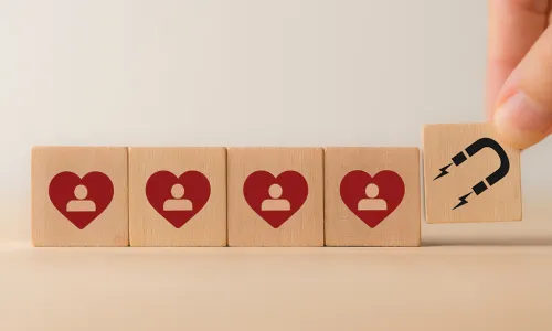 building blocks being attracted by a magnet